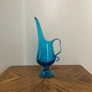 Blue glass pitcher, swung glass pitcher, teal pitcher, mid century glass, ribbon glass handle