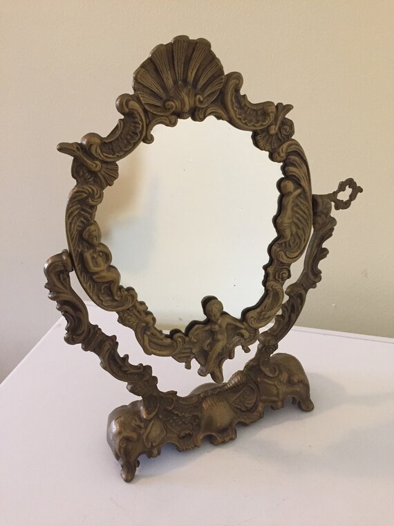 Vintage Brass Vanity Mirror Tilting Art Nouveau Pivoting With Cherubs Shell Pattern Table Top