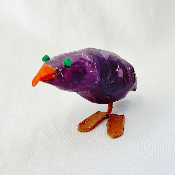 Oiseau en papier mâché fait main