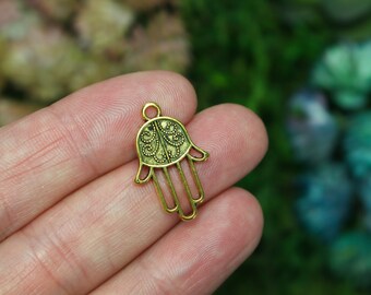 Guldfärgade Hamsa Guds hand-berlocker 22 mm x 15 mm, 25 st