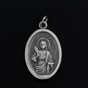 Médaille de Sainte-Lucie - Patronne des aveugles et des malades des yeux - Médaille d'argent oxydé de 2,5 cm pour Sainte-Lucie