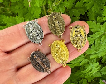 Centros de rosario con medallas milagrosas de 22 x 14 mm - Disponibles en plata, bronce, oro y cobre - Se venden en paquetes de 5 o 25 unidades.