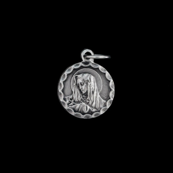 Our Lady of Sorrows Small Round Medal with Ornate Border, 16mm long, Made in Italy