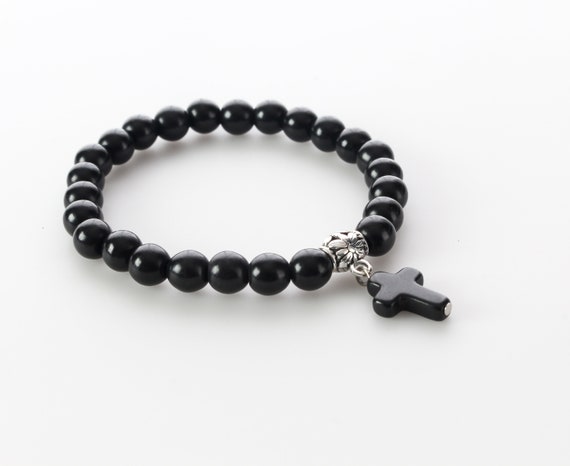 Black Beaded Stretch Bracelet With Cross Charm and Attached Hanger