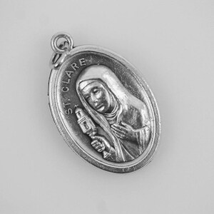 Sankta Klara av Assisi-medaljen - Broderarnas och TV:ns beskyddare - Silveroxiderad platta Tillverkad i Italien bild 2
