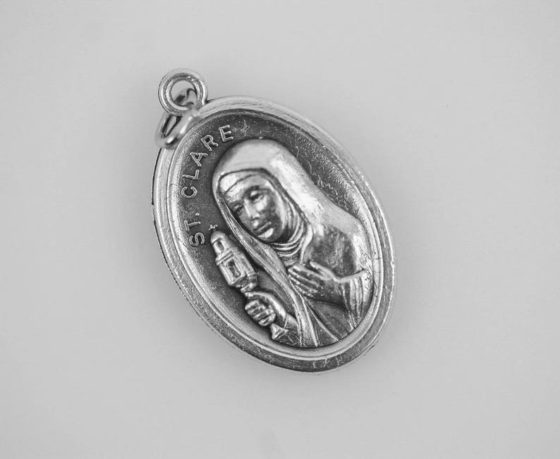 Sankta Klara av Assisi-medaljen - Broderarnas och TV:ns beskyddare - Silveroxiderad platta Tillverkad i Italien bild 2