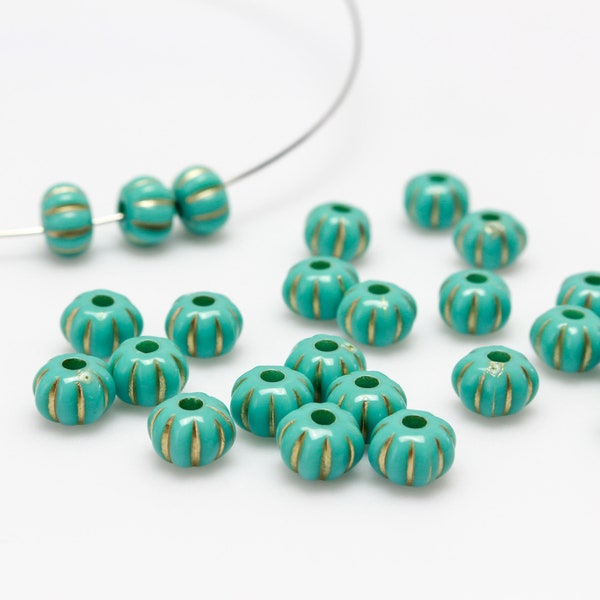 Acrylic Turquoise Beads that are Gold Metal Enlaced, Pumpkin Shaped 7x5mm - 60pcs