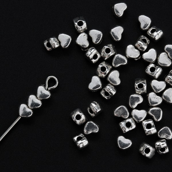 100 Tiny Heart Spacer Beads 4mm wide, 1.5mm hole - Silver Tone Heart Shaped Metal Beads 100pcs