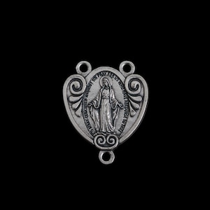 Silver Miraculous Medal Rosary Centerpiece that is Heart-Shaped with Ornate Scrollwork on the sides, English Inscription