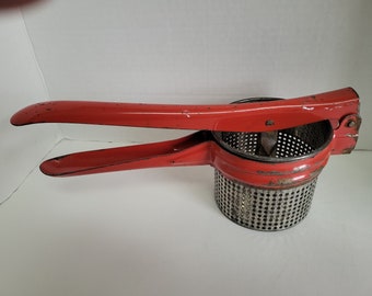 Vintage Red Metal Potato Vegetable Ricer Masher Time Worn