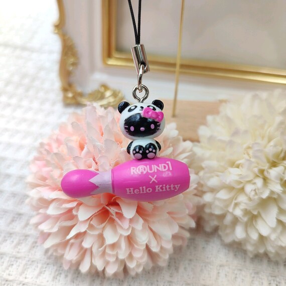 ROUND1 x ハローキティ デビル 携帯チャームストラップ - ブラック