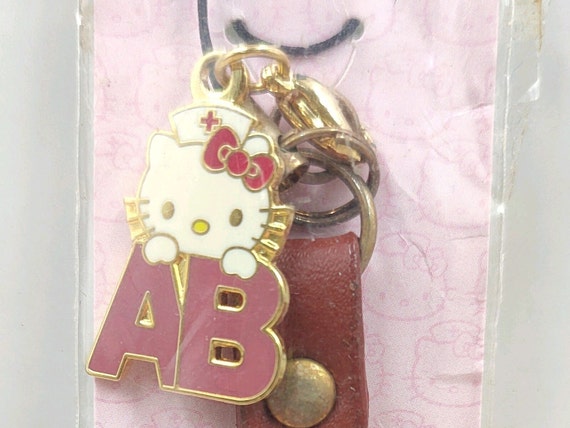キティ　ナース　血液型　ストラップ　サンリオ ヴィンテージ ハローキティ ナース 血液型AB 限定チャーム 携帯