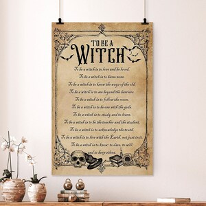 May include: A vintage-style poster with a brown background and ornate black borders. The poster features the text "To Be A Witch" in a decorative font. The text is followed by a list of qualities associated with being a witch, such as "to love and be loved", "to harm none", and "to follow the moon". The poster is decorated with images of skulls, a witch's hat, and a book.