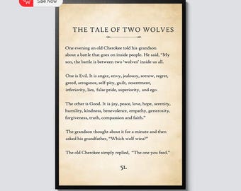 May include: A framed print with the text "THE TALE OF TWO WOLVES" in a serif font. The text describes a Cherokee tale about the battle between good and evil within people. The print has a vintage paper appearance and a black frame.