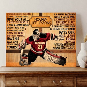 May include: A hockey goalie in red and white uniform with the name "Simeon" and number "21" on the back. The image is a motivational poster with hockey life lessons written on a wood background.