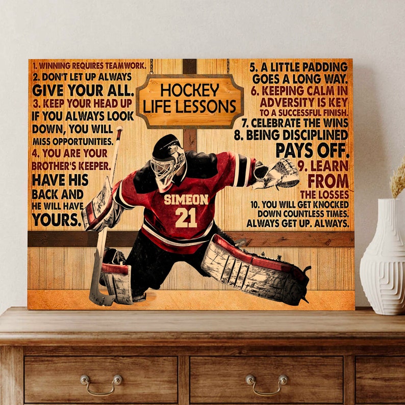 May include: A hockey goalie in red and white uniform with the name "Simeon" and number "21" on the back. The image is a motivational poster with hockey life lessons written on a wood background.