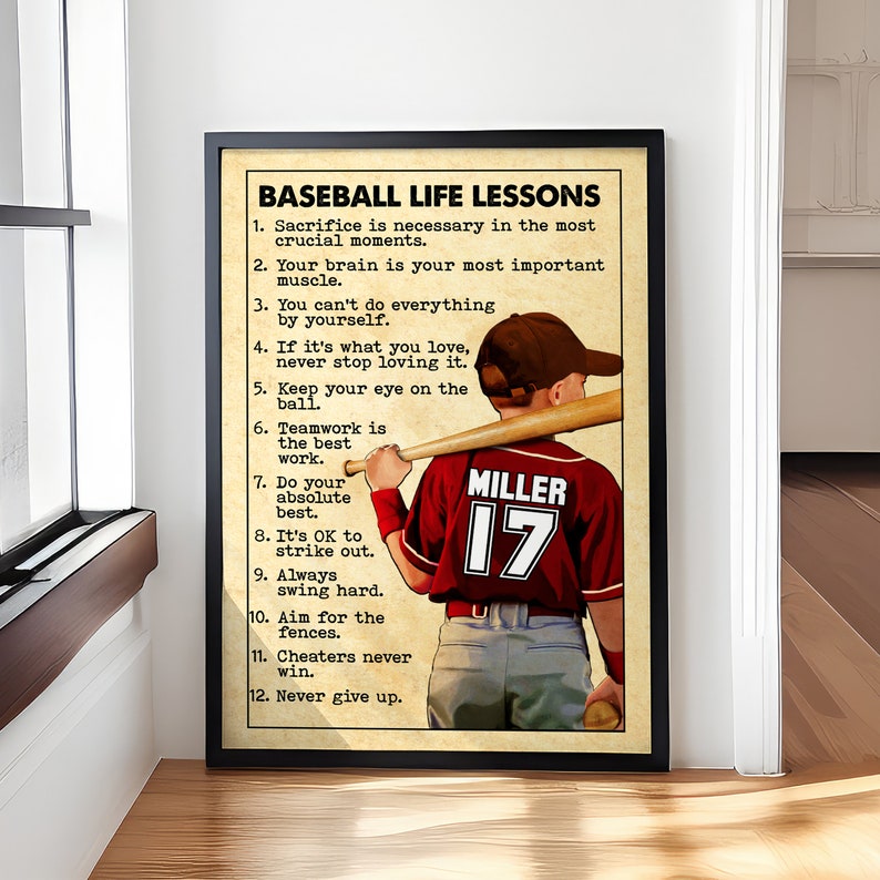 May include: A vintage-style poster with a baseball player holding a bat. The poster has a tan background with brown text. The text reads 'Baseball Life Lessons' and lists 12 lessons. The player is wearing a red jersey with the number 17 and the name 'Miller' on the back. The poster is framed in black.