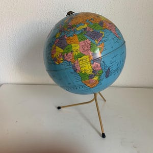 Globe vintage 1960 terrestre Taride tripode métal doré - 28 cm
