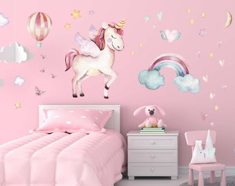 May include: A pink bedroom with a white bed and a pink chair. The wall is decorated with unicorn, rainbow, and star wall decals.