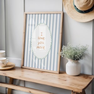 a picture frame sitting on top of a wooden bench