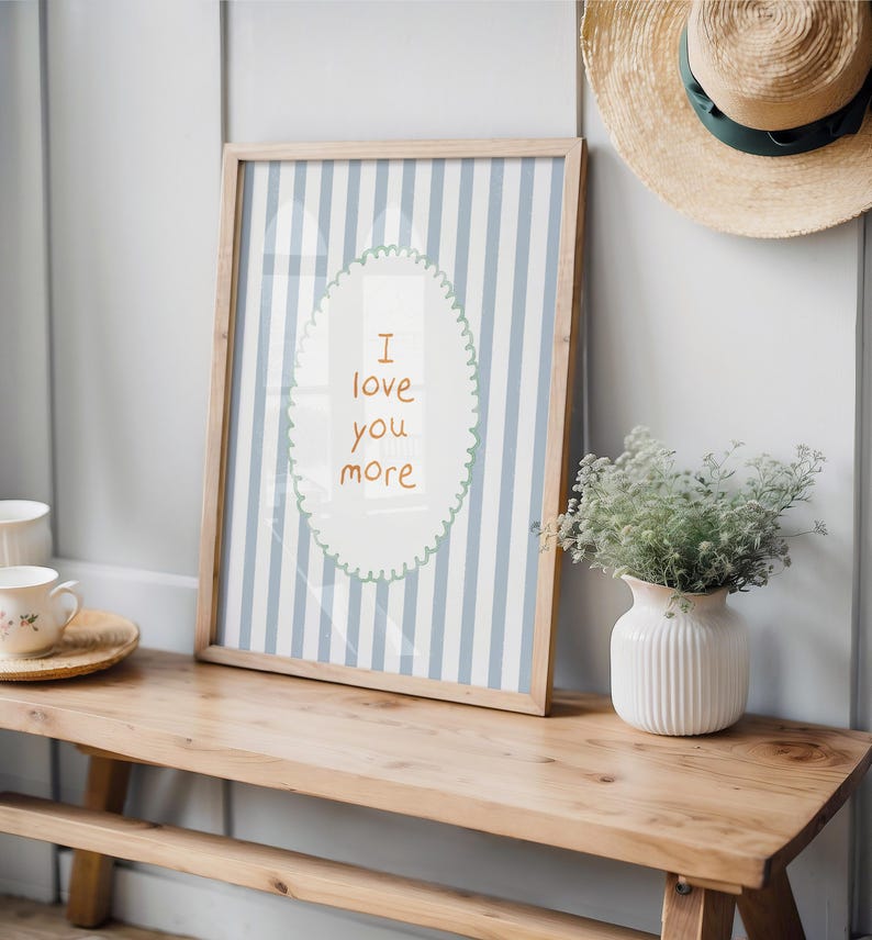 a picture frame sitting on top of a wooden bench