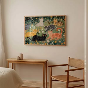 a room with a bed and a painting on the wall