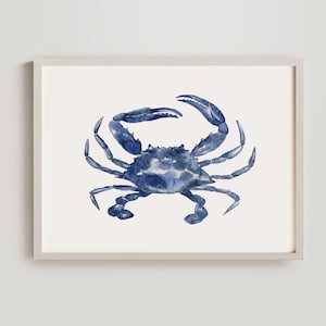May include: A watercolor painting of a blue crab on a white background. The crab is facing to the right and has its claws raised.