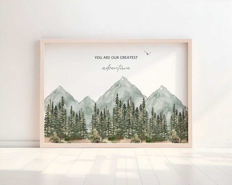 a picture frame with a picture of mountains and trees