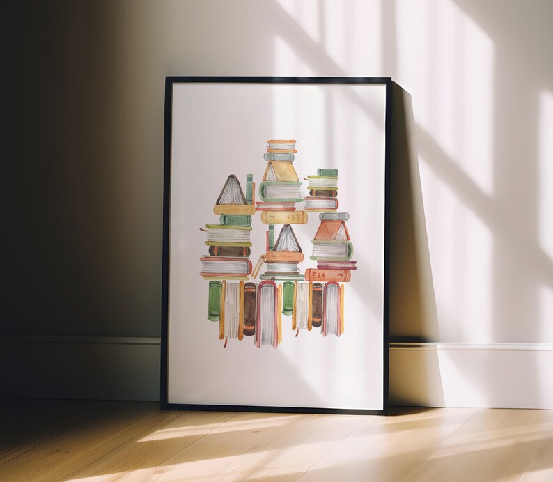A framed watercolor painting depicting a stack of colorful books on a shelf.