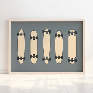 A framed illustration of five skateboards in a row, each with a distinct design, against a gray background.