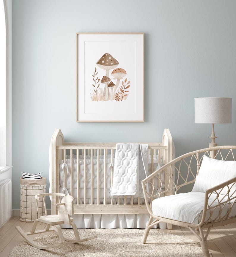 a baby's room with a rocking chair, crib, and a mushroom