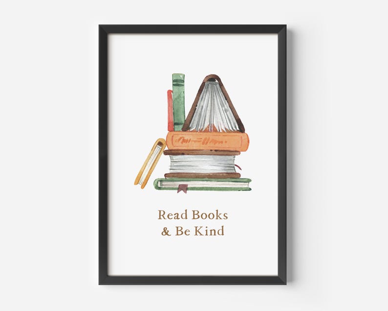 The image is a framed print with a watercolor illustration of a stack of books, accompanied by the text "Read Books & Be Kind" below the illustration.