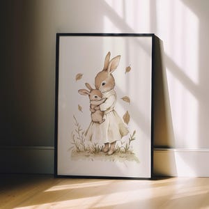 a picture of a bunny holding a baby bunny