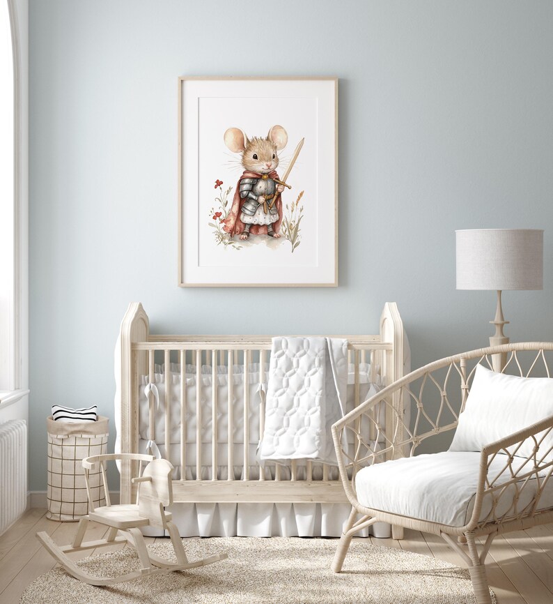 A nursery room with a wooden crib, a rocking chair, and a framed picture of a mouse wearing a knight's helmet on the wall.