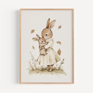 a watercolor painting of a bunny holding a baby bunny