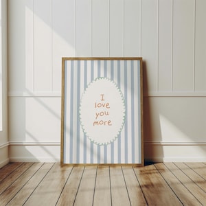 a picture frame sitting on a wooden floor