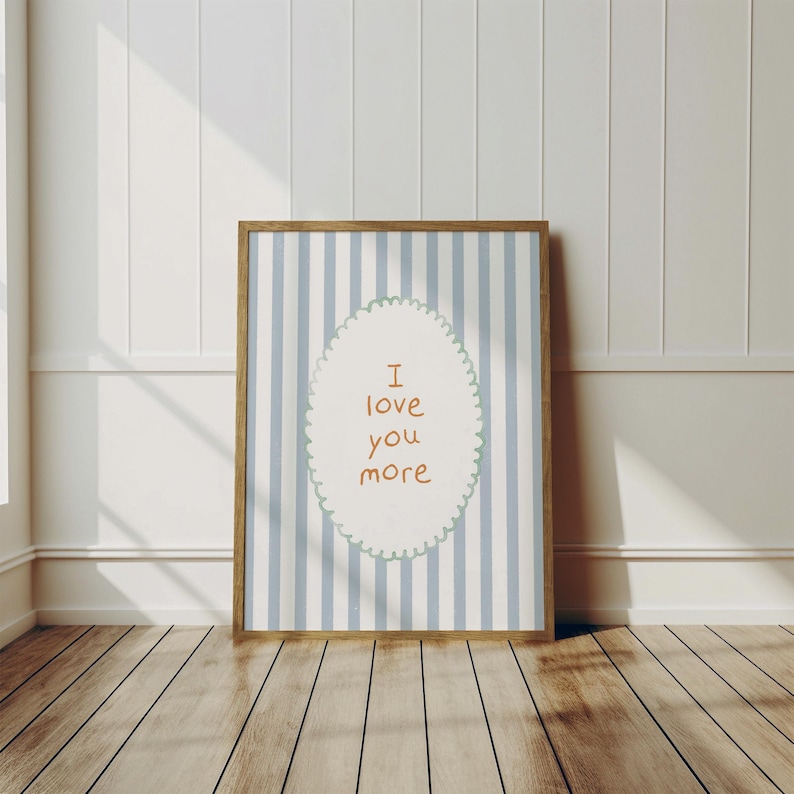 a picture frame sitting on a wooden floor