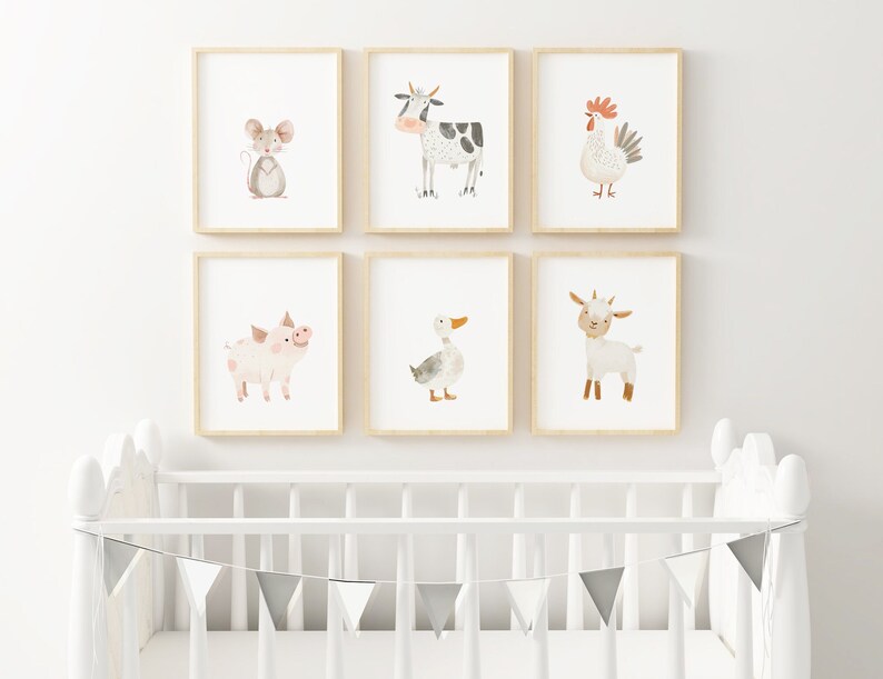 May include: Six framed watercolor illustrations of farm animals, including a pig, a cow, a rooster, a duck, a goat, and a mouse. The illustrations are set against a white background and are displayed in a nursery setting.