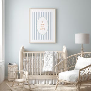 a baby's room with a rocking chair and a crib
