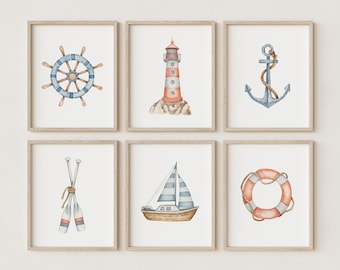 May include: Set of six nautical themed prints featuring a lighthouse, anchor, life preserver, sailboat, oars, and a ship's wheel. The prints are in a watercolour style with blue, red, and white colours.