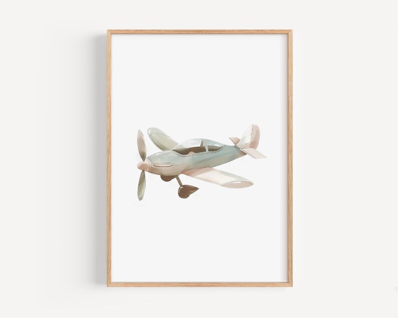 a framed photograph of an airplane flying in the sky