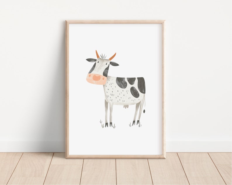 May include: A watercolor illustration of a black and white cow with orange horns and a pink nose. The cow is standing on a green field.