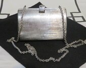 1970s- 1980s Silver Metallic Shoulder Bag Clutch- Made in Italy- Silver Leather Lining- One Pocket- 4 3 4 quot L X 3 1 4 quot T X 21 4 quot W-