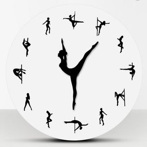 May include: A white round clock with black silhouettes of dancers in various poses around the clock face. The dancers are all holding a pole.