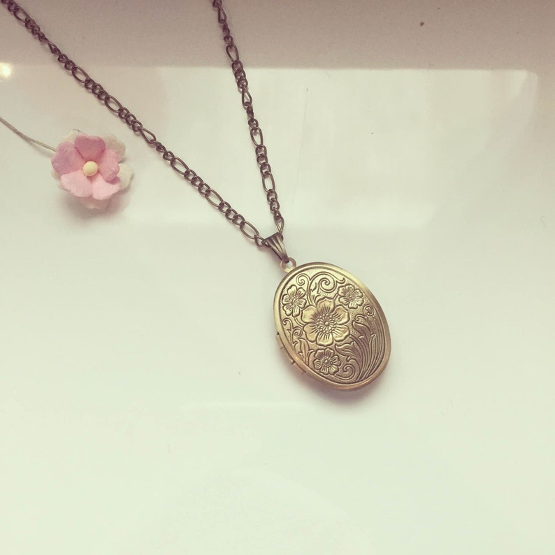 Long chain with charm faith symbol