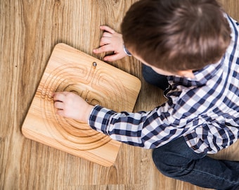 Relaxing board game: Finger labyrinth.