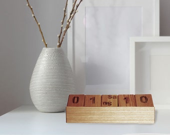 Natural wooden block perpetual calendar.