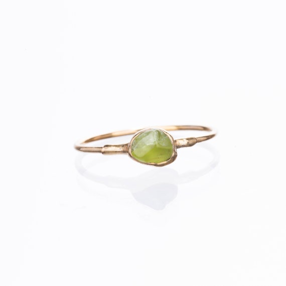 raw peridot ring