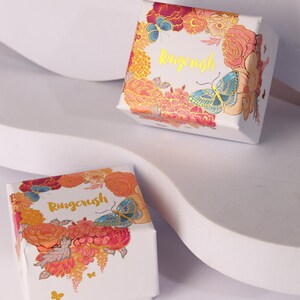 Ringcrush floral gift box packaging with gold foil logo