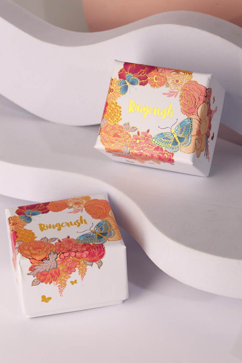 Ringcrush floral gift box packaging with gold foil logo